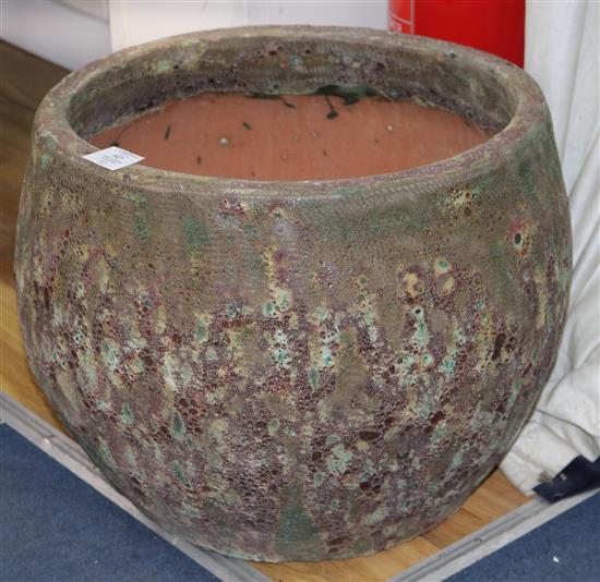 A pair of glazed terracotta garden planters, diameter 47cm